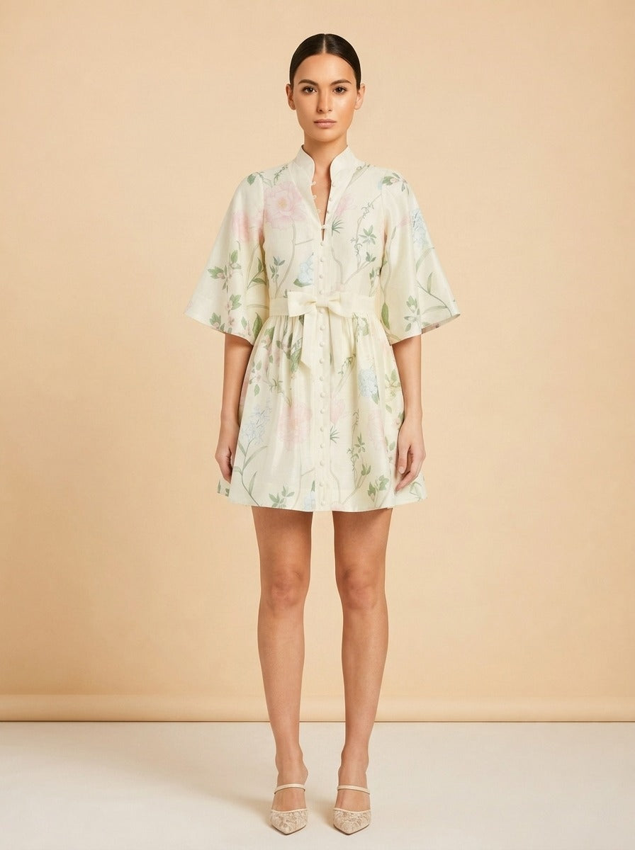 Mestiza New York Carmen Floral-Print Bow Mini Dress (cream/hummingbird) — on model, front