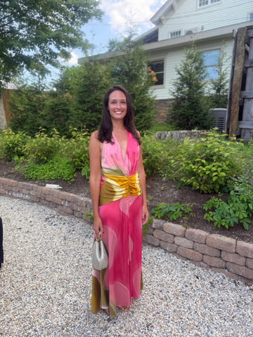 Rent with Reve customer in a pink and gold gown