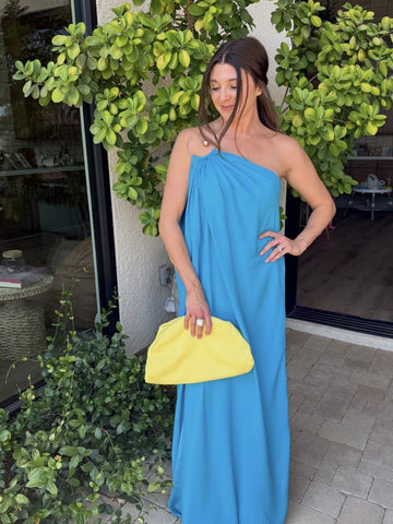 Rent with Reve customer in a blue one-shoulder gown